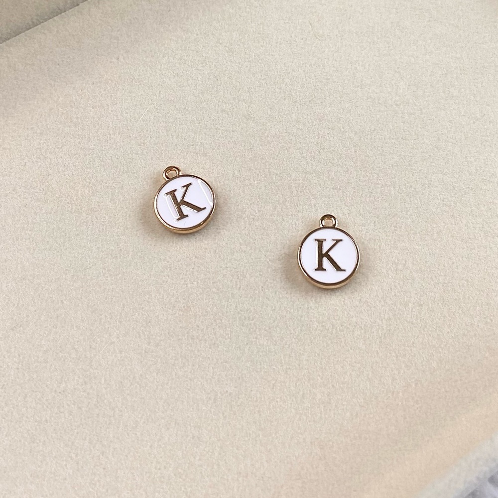 White Circle Letter “K” Charm